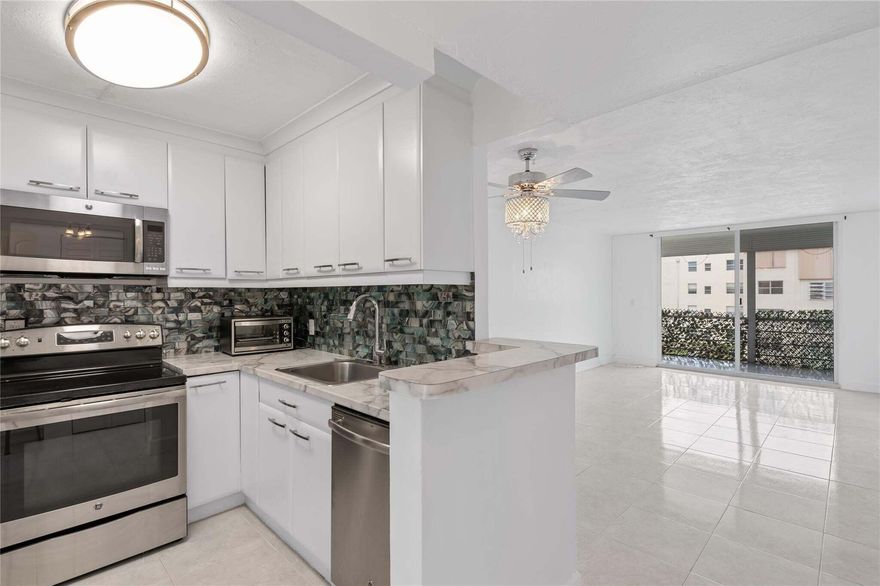 Beautifully maintained home in the heart of Fort Lauderdale featuring full impact windows and door. providing safety, energy efficiency, and peace of mind. this move in property offers a bright open layout, spacious living area and abundant natural light throughout.