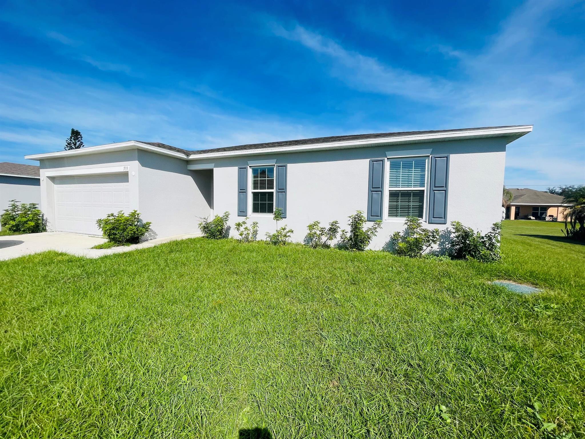 Welcome to this beautiful rental property located in the heart of Port Saint Lucie. This spacious and modern home was built just two years ago, offering contemporary living in a convenient location.Key Features:, 3 Bedrooms, 2 Bathrooms, Plush carpeting in all bedrooms, Granite countertops in the kitchen & bathrooms, White kitchen cabinets with stainless steel appliances, Move-in ready, fully equipped with stainless steel appliances except washer and dryer.2-Car Garage, Open backyard for children to play. This meticulously maintained property is move-in ready, making it an ideal choice for individuals and families seeking a comfortable and stylish living space. The bedrooms are adorned with soft carpeting for added comfort, and the kitchen boasts sleek granite countertops paired with