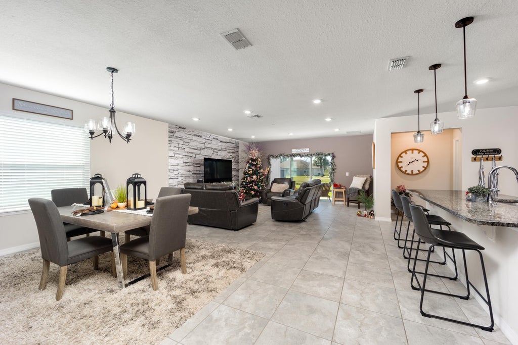 Photo of 5520 NW Thyer Circle, Port Saint Lucie, FL 34983 (MLS # R10943073)