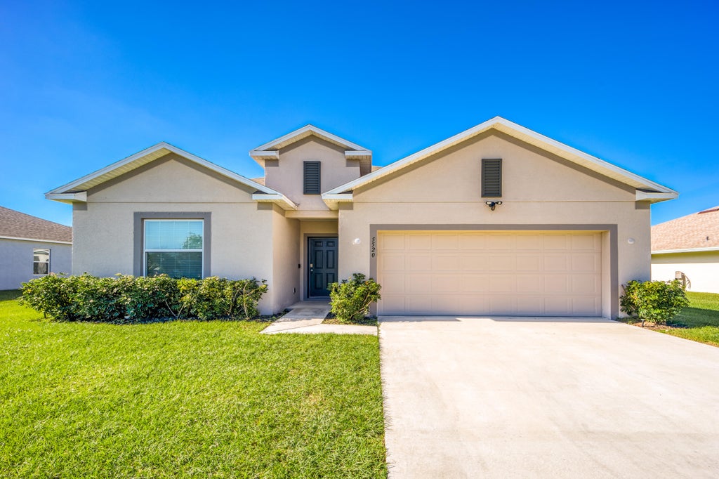 Photo of 5520 NW Thyer Circle, Port Saint Lucie, FL 34983 (MLS # R10943073)