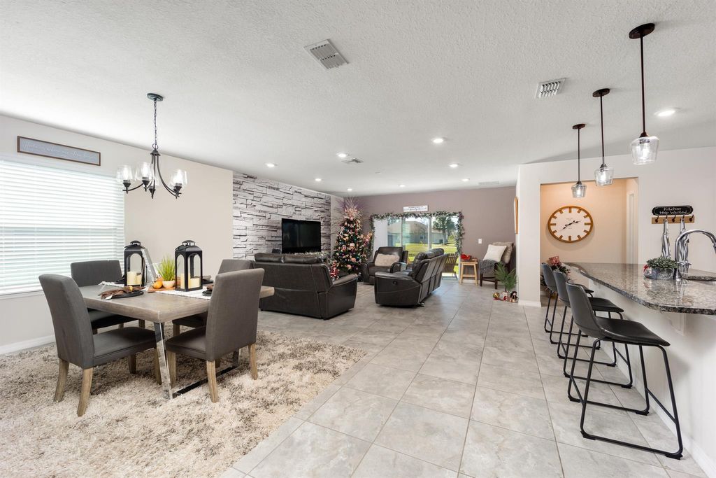 Photo of 5520 NW Thyer Circle, Port Saint Lucie, FL 34983 (MLS # R10943073)