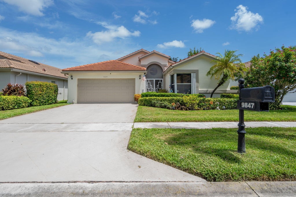 Photo of 9847 Harbour Lake Circle, Boynton Beach, FL 33437 (MLS # B26077392)