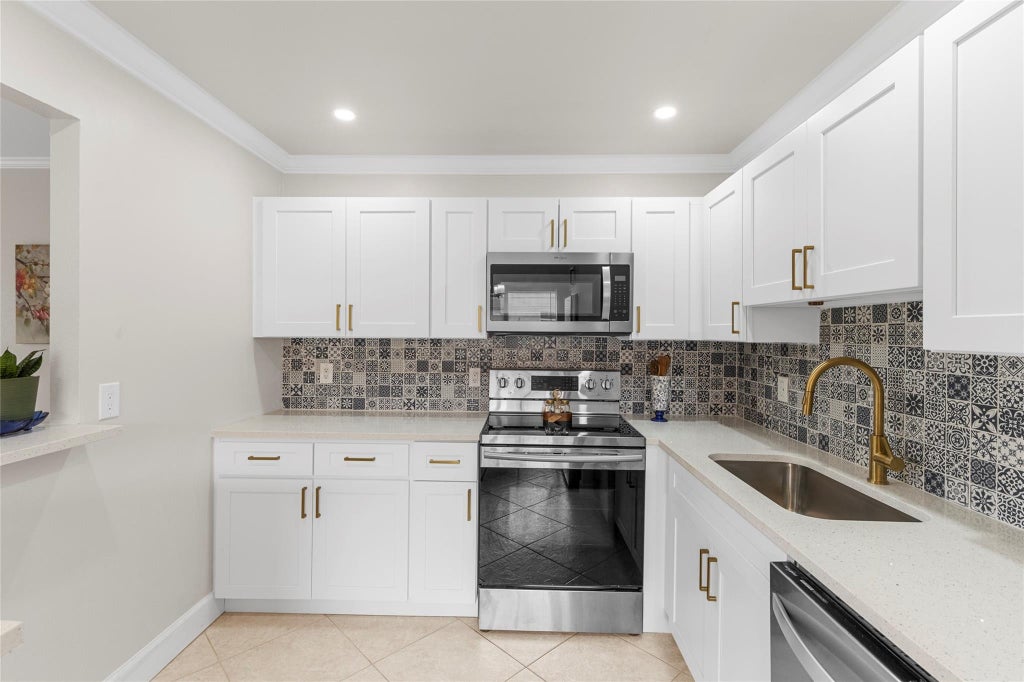 Photo of 251 SEVILLE K #251, Delray Beach, FL 33446 (MLS # B26057809)