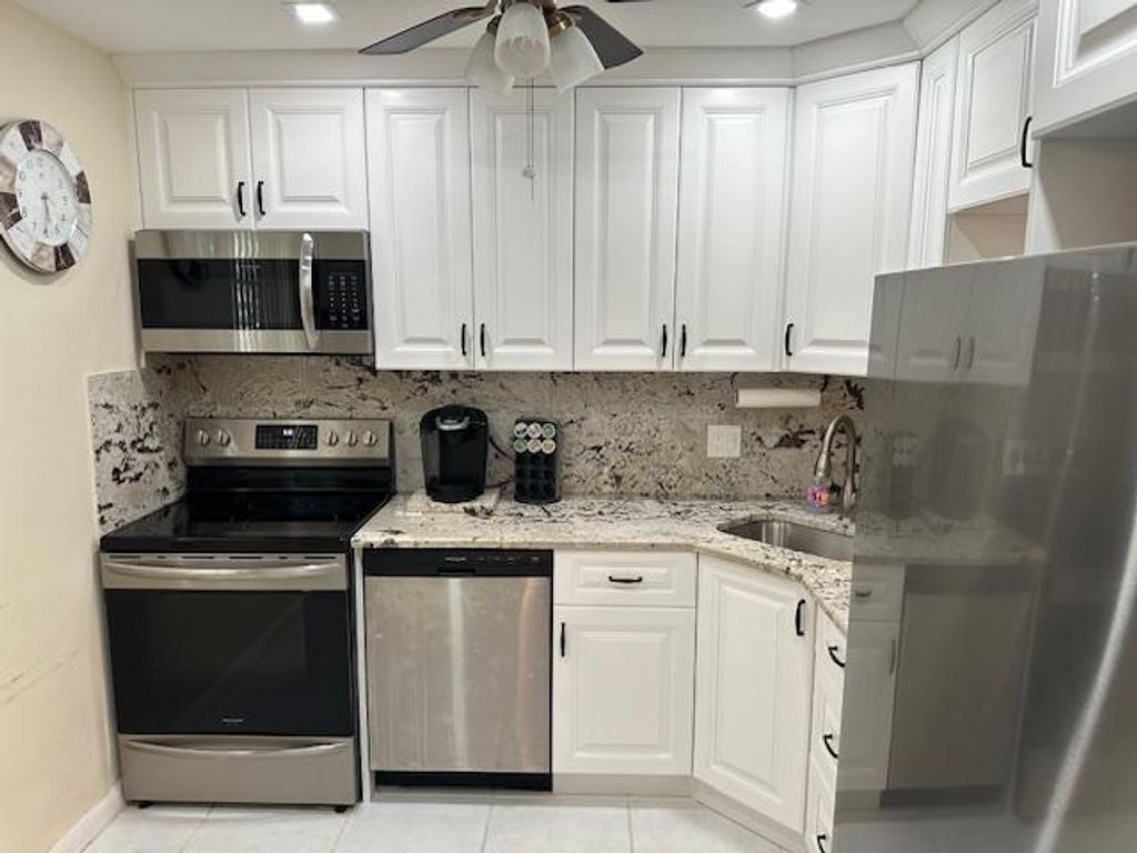 Photo of 7680 NW 1st Street #102, Margate, FL 33063 (MLS # B26025038)