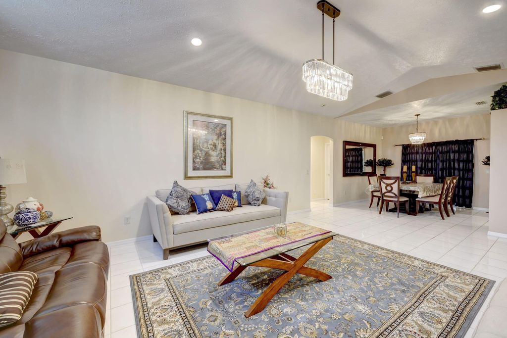 Photo of 803 Sandburg Lane Ln, Port St Lucie, FL 34952 (MLS # R10772803)