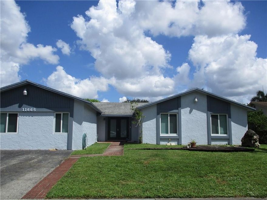 Beautiful 3 bedroom 2 bath Home with the potential for a 4th bedroom.  In addition there is a bonus room converted garage.  Great for a big family.  New A/C in 2021 as well as Impact Windows and Doors.  New screened in patio.   High Ceilings in Living Room Dining Room area.  Reverse Osmosis system does not convey.   A Rated Schools.