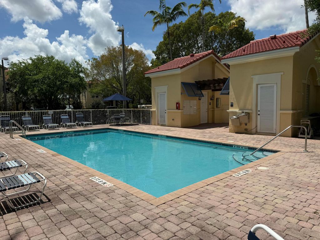 Photo of 130 Jacaranda Country Club Drive #207, Plantation, FL 33324 (MLS # F10549021)