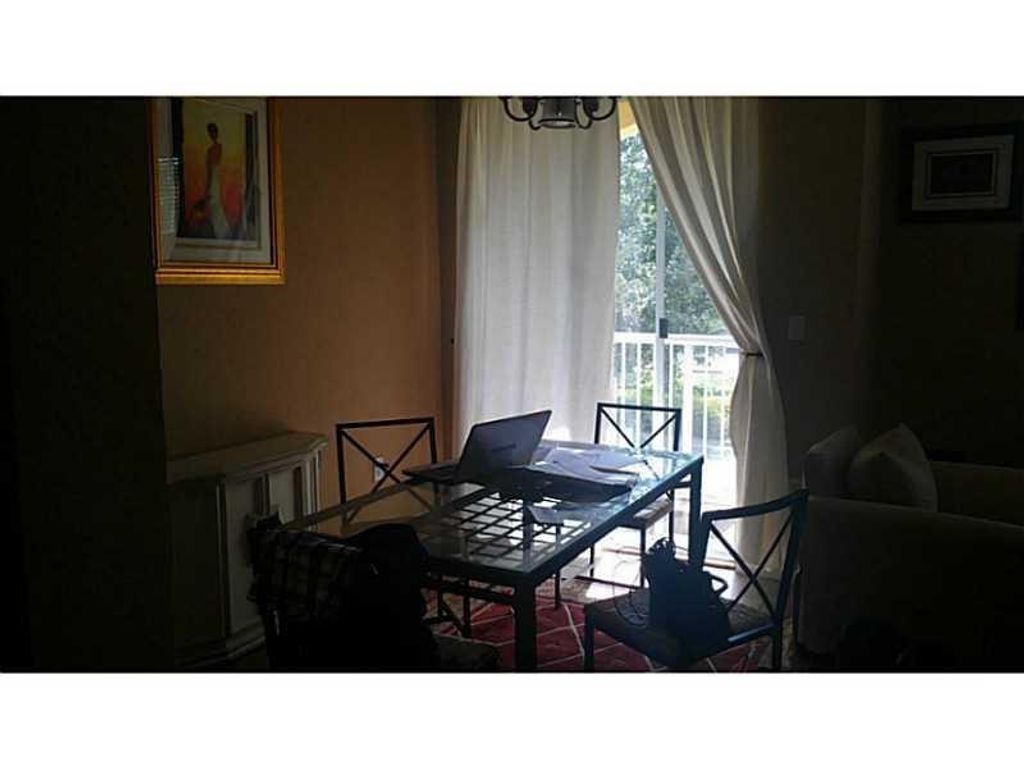 Photo of 130 Jacaranda Country Club Drive, Plantation, FL 33324 (MLS # F10549021)