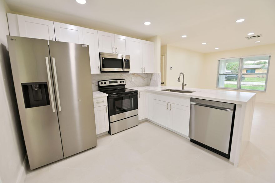 Fully renovated 3 Bedroom / 2 Bathroom + Den single-family home. Move-in ready with brand-new modern kitchen featuring quartz countertops, stainless steel appliances, and 24x48 porcelain tile flooring throughout. Freshly painted interior, updated bathrooms, and new central A/C. Impact windows for safety and energy efficiency. Spacious fully fenced backyard, perfect for outdoor living. Great location near shopping, dining, and major roads. No HOA. Available for immediate occupancy.