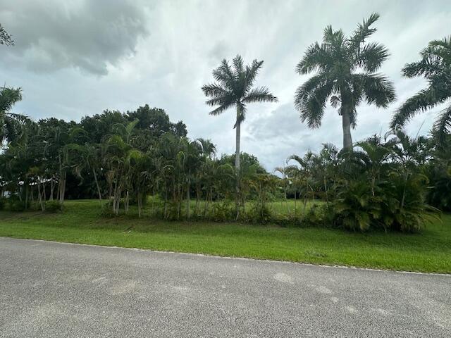 Great opportunity to own two adjacent lots with separate parcel ID's. Build your dream home on one lot and hold the other as an investment. Partially cleared and leveled. Builders dream !!! Located in the desirable area of White City. Seconds to US 1, shopping center minutes away and 5 minutes to the Indian River Lagoon. Located on a street of well maintained 1/2 acre homes. County only taxes. Don't miss this unique opportunity.