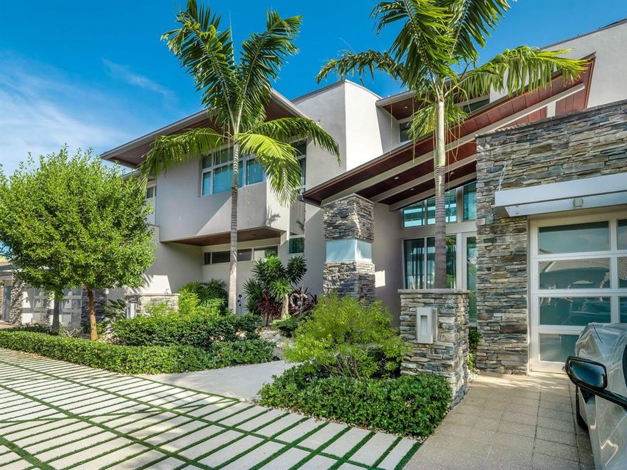 2019 Masterpiece by Acclaimed AZD Architects in Santa Barbara Shores!  Premium Finishes, European Design, Italian Cabinets, German Fixtures, and extravagant features.  Please click the ''Virtual Tour'' link for a 3D Walk-Through and video where craft and detail-oriented design collide to create timeless aesthetics.  Please see ''Features & Enhancement Document'' for complete list of all features, enhancements, models, and finishes. 3 car garage.  Upstairs Laundry + Downstairs Laundry. 2019 CONSTRUCTION

Boat size: 90'

Fixed bridges: NO

Age of dock:  2019

100' concrete; IPE Covered columns, for post IMM, 20,000 pound lift plus floating dock for JetSki

Age of boat lift 2019

--Age of seawall 2019

Waterfront depth Middle of the canal is about 8-10' and it's 5' at the dock  - one of the neighbors has a 65' Viking and another has a 68' sailboat and they're beyond us and get by okay 

100' concrete dock: IPE covered columns, 4 post IMM 20k# lift & floating dock for jet ski
Electric gates 
60"x30" Porcelain tile throughout 
Glass-backed water feature 
Natural gas tankless water heater, pool heater, BBQ, dryers (2) & stove top
Elevator: electric automatic commercial
Smart house technology
Legrand pop-out outlets throughout 
2 AC units & 2 mini-units
Full house Generator 
1 car garage: Full wall built-ins, slat wall & polymer floor coating
2 car garage: Premier Garage cabinetry, fridge, wall mounted TV, polymer floor coating 
Electric car hookup in both garages
Impact rated glass garage doors
Fleetwood glass entry door
Windoor Impact full wall sliders
Hunter Douglas Silhouette Shades & Roller shades throughout

LIVING ROOM
20ft ceiling 
Linear gas fireplace w/ Porcelanosa metal tile surround 

DINING ROOM
Custom serving bar: Perlick beverage/wine fridge & top-zero sink & Hangrohe faucet

KITCHEN
Aster cabinetry w/ retractable doors & steel pullout
Miele refrigerator, freezer, microwave, combi/steam over, convection oven, 6 burner range top & hood, professional dishwasher (extended warranty till 2023)
Silestone counter top 
Dekton Full Wall Backsplash (Dekton is a sophisticated blend of raw materials to produce the highest quality glass and Quartz

Island w/ built-in metal table 
TopZero seamless edge/oversized sink & Dornbracht (German) pull down faucet

MEDIA ROOM: reclining seats, surround sound & Alf-da Dre built-in cabinetry

Full bath by media
wall hung Kohler toilets
Porcelanosa tile & vanity
Grohe 10x10 flush Rain Head & faucets/linear drain

UTILITY  BUTLER'S PANTRY
Aster cabinetry
Silestone counters
Sink
Stackable Speed Queen washer/dryer

UPSTAIRS LAUNDRY
Aster cabinetry
Silestone counters
Sink
Electrolux pedestal washer & dryer (gas)

MASTER BEDROOM (upper)
Custom barndoor
Morning bar w/ Aster cabinetry, Silestone counter top, TopZero sink, Hansgrohe faucet & Subzero fridge
Modern Flames electric fireplace
Electric Hunter Douglas Luminette Shades

MASTER BATH (upper)
Duravit free-standing tub
Floor to ceiling Roberto Cavalli tiles 
20x20 Rain Shower
linear drain
glass enclosure 
Kohler toilet & bidet
Towel warmer
Ceiling hung mirrors
Duravit vessel sinks
Hansgrohe faucets
Aster glass cabinets 

MASTER CLOSET (upper)
Falma: Italian custom cabinetry 
Built-in vanity
8 Drawer island
4 Drawer chest

OFFICE or 1st FLOOR BEDROOM
Alf-da Dre built-in cabinetry
Walk-in closet
Kohler wall hung toilet & Porcelanosa tiles & vanity
Grohe 10x10 flush Rain Head & faucets, Linear drain

Powder bath
Porcelanosa tiles & sink

BEDROOM 3
En-suite: Kohler wall hung toilet, Grohe faucets, 10x10 flush Rain Head w/ linear drain
Porcelanosa tile & vanity & walk-in closet


BEDROOM 4
Walk-in closet
Built-in Aster desk w/ Silestone countertop

Jack/Jill bath w/ custom Aster wall-to-wall glass cabinets 
Alape vessel sinks 
Grohe wall-mounted faucets
Grohe 10x10 flush Rain Head & faucets w/linear drain
Wall mounted Kohler toilet 

BEDROOM 5
Wall to wall built-in closet


Covered Terrace w/ Phantom Electric Screens 
Dekton counters
Rondon patio furniture 
Stainless steel doors 
Alfresco BBQ w/ 2 side burners & warming drawer
Scotsman icemaker
Alfresco fridge
Alfresco specialty sink
2 ceiling fans

Outdoor Shower Company shower

Salt water pool/spa w/ gas heater

Mosquito Misting System