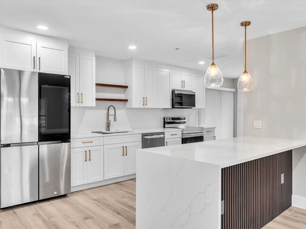 Photo of 10691 NW 28th Street, Sunrise, FL 33322 (MLS # B26020574)