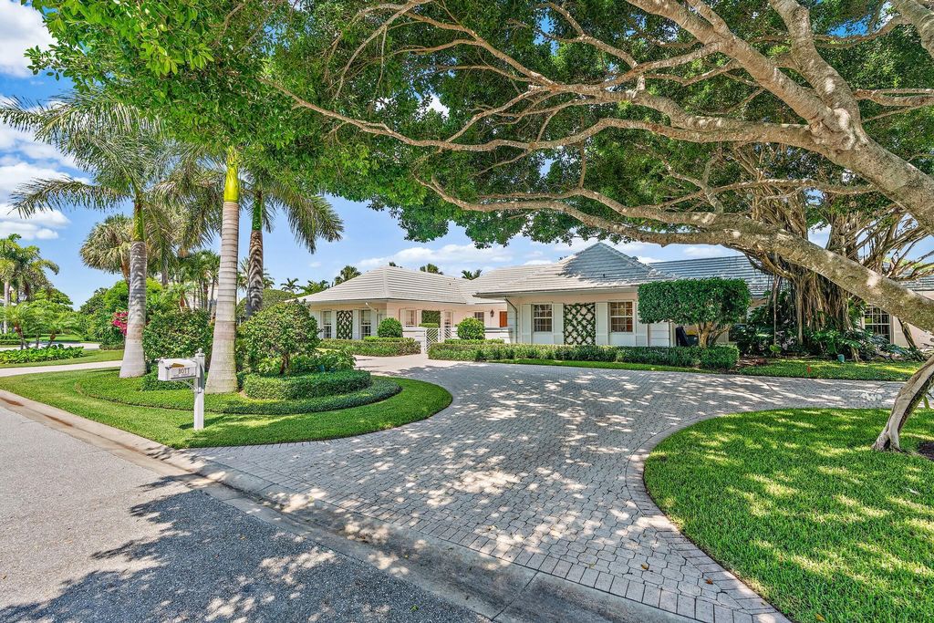 Photo of 12105 Surrey Ln, North Palm Beach, FL 33408 (MLS # R10909421)