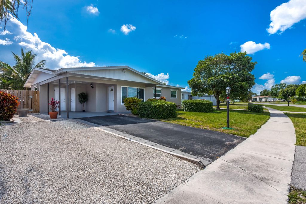 Photo of 12346 Hillman Drive, Palm Beach Gardens, FL 33410 (MLS # R10985755)