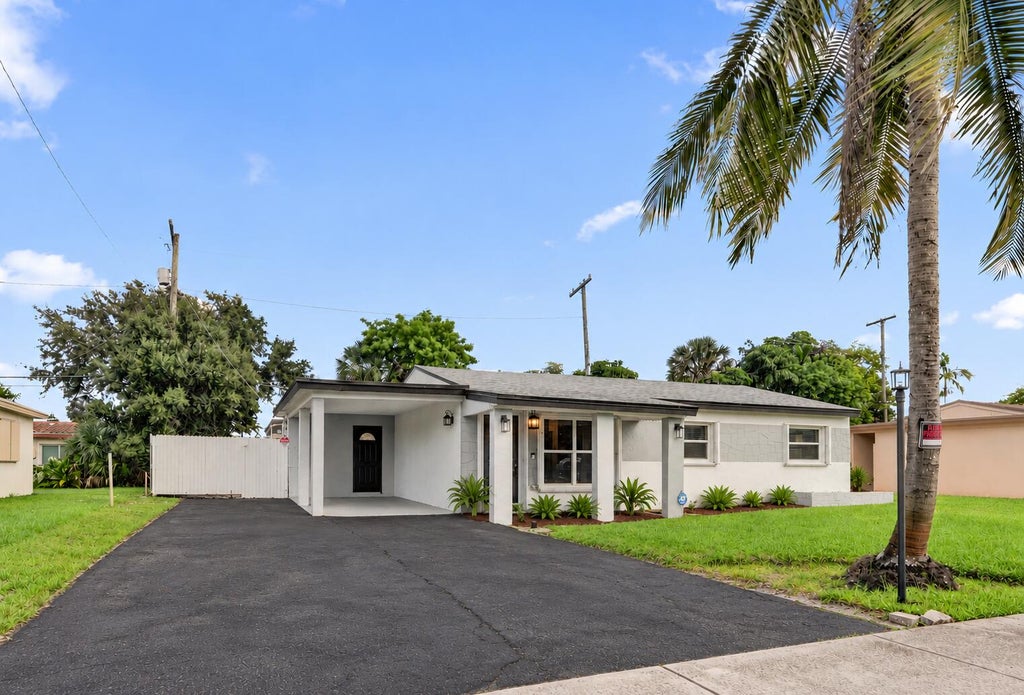 Photo of 3851 NW 4TH Place, Lauderhill, FL 33311 (MLS # B26090810)
