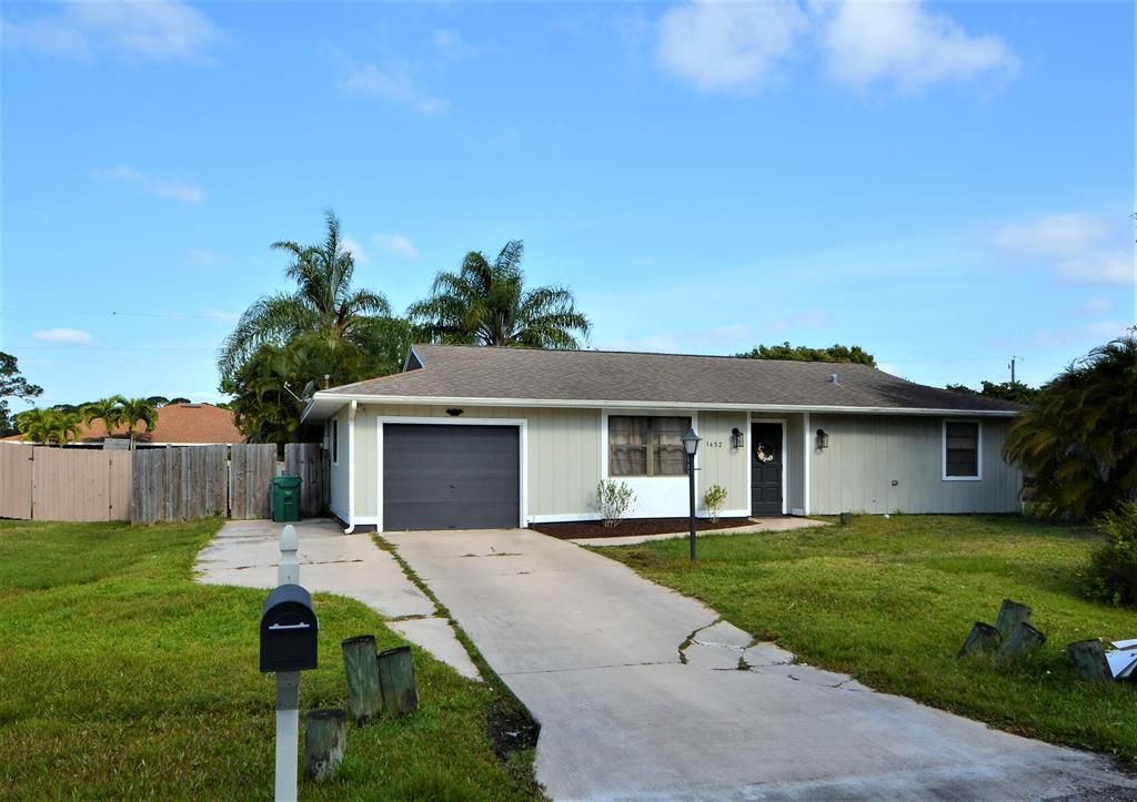 Photo of 1652 SE Pleasantview Street, Port Saint Lucie, FL 34983 (MLS # R10708419)