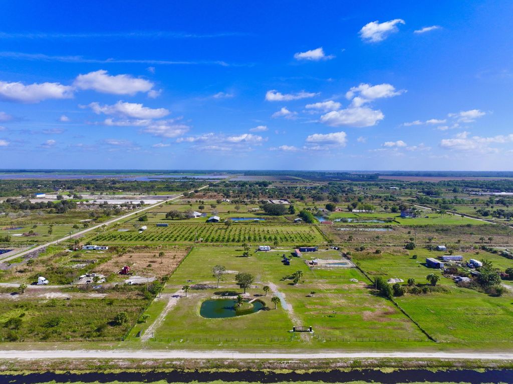 Photo of 6464 Dennis Street, Loxahatchee, FL 33470 (MLS # R11048372)