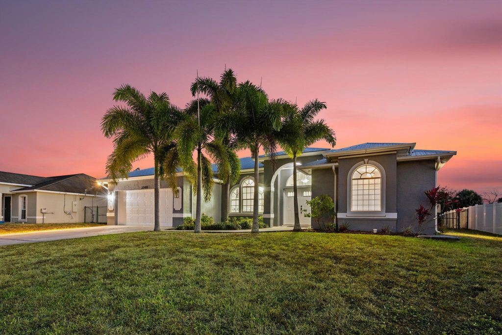 Photo of 2348 SW Webster Lane, Port Saint Lucie, FL 34953 (MLS # R11086706)