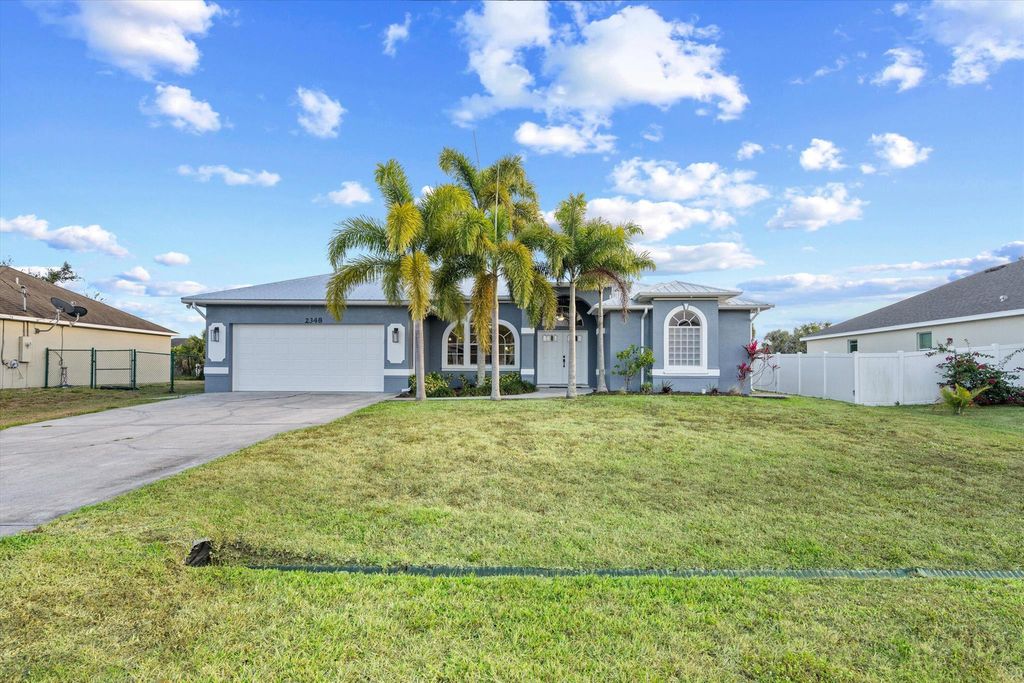 Photo of 2348 SW Webster Lane, Port Saint Lucie, FL 34953 (MLS # R11086706)