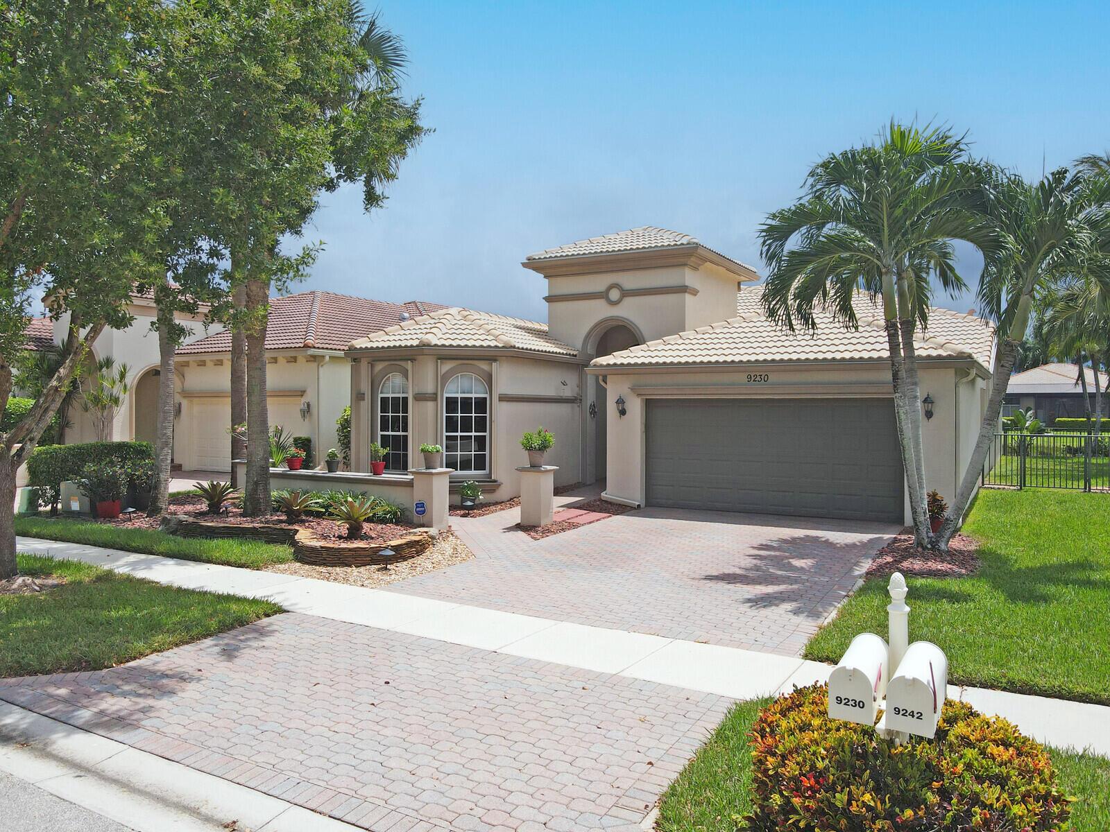A rarely available & sought after Triana model finally hits the market! This meticulously maintained home is situated on a premier waterfront lot w/ an easement along the West side offering an expansive feel & is located on a quiet cul-de-sac street. From the moment you arrive, you'll be greeted by the beautiful paver entry w/ a privacy wall, leading into this light-filled home designed w/ both elegance & functionality. Featuring 2 bedrooms, 2.5 baths, a den, formal living room, formal dining room, & an oversized office w/ a custom stylish & functional built-in, this residence offers an abundance of versatile living space. The home is enhanced w/ IMPACT GLASS (partial), ACCORDION HURRICANE SHUTTERS (partial), & an IMPACT GLASS front entry door w/ sidelight for peace of mind. Inside ...