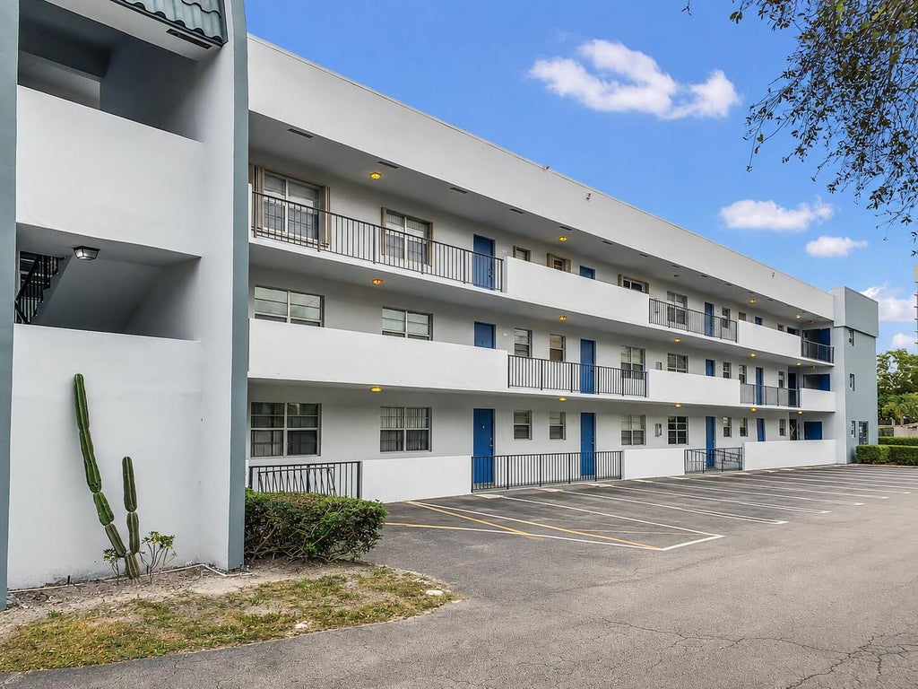 Photo of 1630 EMBASSY Drive #309, West Palm Beach, FL 33401 (MLS # B26067675)