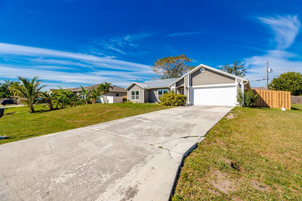 Photo of 4268 SW JARED Street, Port Saint Lucie, FL 34953 (MLS # B26079855)
