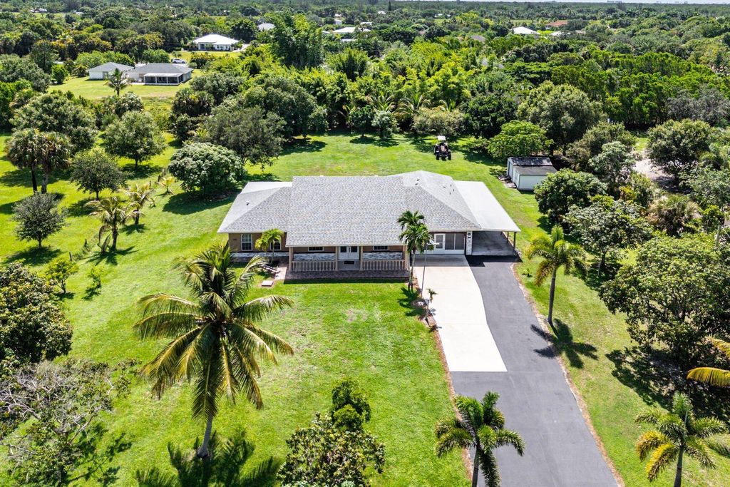 Photo of 15340 93rd Lane N, Jupiter, FL 33478 (MLS # R11107368)