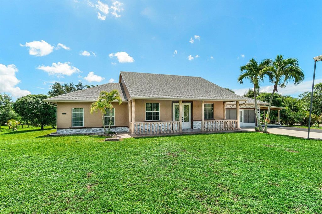 Photo of 15340 93rd Lane N, Jupiter, FL 33478 (MLS # R11107368)