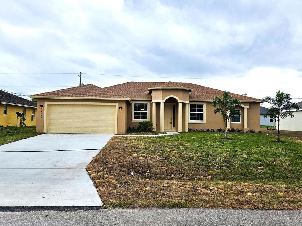 Photo of 1562 SW Santander Avenue, Port Saint Lucie, FL 34953 (MLS # R10980831)