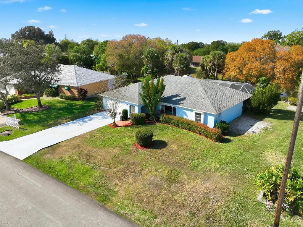 Photo of 127 NE Naranja Avenue, Port Saint Lucie, FL 34983 (MLS # R11151779)