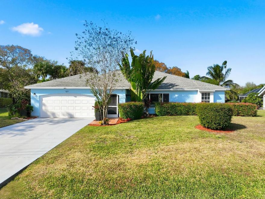 Welcome to your private waterfront retreat with ocean access. This beautifully updated 3-bedroom, 2-bathroom pool home offers the perfect blend of comfort, style, and true Florida living with NO HOA. Built in 1988 and thoughtfully refreshed, this 1,809 sq ft residence features partial impact windows with accordion shutters for full hurricane protection, new flooring throughout, and an inviting open concept layout designed for easy living and effortless entertaining. The stunning kitchen includes a large island, creating the ideal gathering space for family and friends.

Enjoy year-round outdoor living with a solar-heated in-ground pool, an expansive large lanai, and a screen enclosed vestibule that flows seamlessly to the backyard. Boaters will love the 50-foot dock with ocean access, even including a mechanical boat lift, Tiki bar, and dedicated RV parking spot with 30 amp service. This spacious almost half acre property also includes a pad for trailer parking. This truly is a boater's haven and fisherman's fantasy. After a day on the water, relax by the cozy fireplace or unwind while taking in the peaceful natural surroundings of this quiet neighborhood. 

Inside, the home features a split floor plan with a spacious primary suite, complete with full walk-in closets for generous storage. Additional conveniences include a two-car garage with stand-up attic storage space.

Located in Port St. Lucie one of the fastest-growing cities in Florida this home offers not only an incredible lifestyle but also outstanding long-term appeal. With modern updates, storm protection, no HOA restrictions or fees, waterway access, and proximity to multiple shopping districts and beautiful beaches, this property delivers the perfect balance of relaxation, recreation, and everyday convenience. Don't miss the opportunity to make this exceptional waterfront gem your own