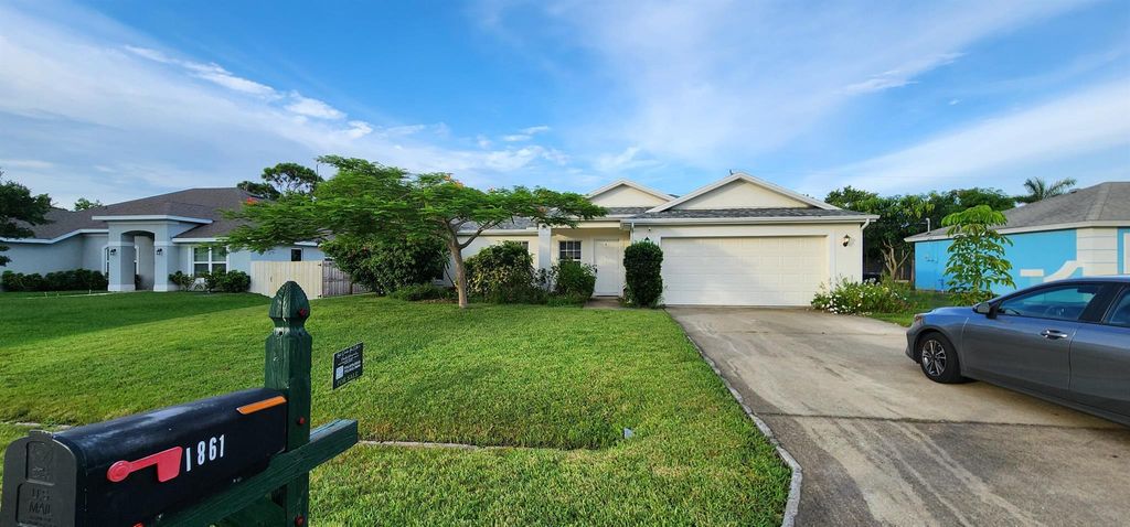 Photo of 1861 SE Balleto Street, Port Saint Lucie, FL 34952 (MLS # R11012217)