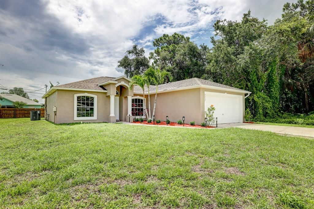 Photo of 2257 SW Matheson Terrace, Port Saint Lucie, FL 34953 (MLS # R10729314)