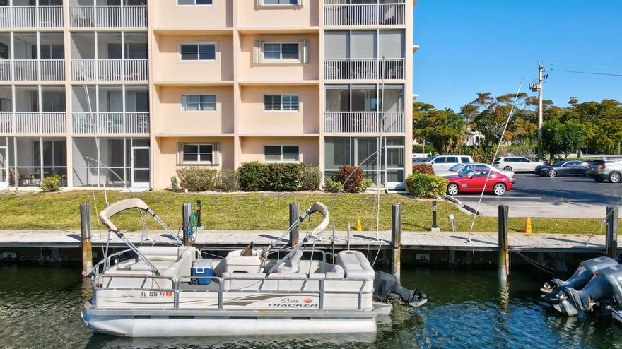 A deeded private boat dock accommodating up to a 30 foot vessel with direct ocean access and no fixed bridges sets the tone for a winter lifestyle centered on sun, water, and effortless coastal living. This corner residence at Boca House captures glowing sunrises and passing boats through prized east and south exposures, filling the home with natural light and coastal breezes throughout the day. Mornings begin on the water, afternoons at the beach, and evenings at Mizner Park or East Boca's dining scene, all just minutes away. Tile flooring runs throughout, and the updated kitchen offers immediate comfort with the option to personalize over time. Ideal as a lock and leave seasonal retreat, this residence delivers boating freedom, convenience, and the relaxed sophistication snowbirds seek.