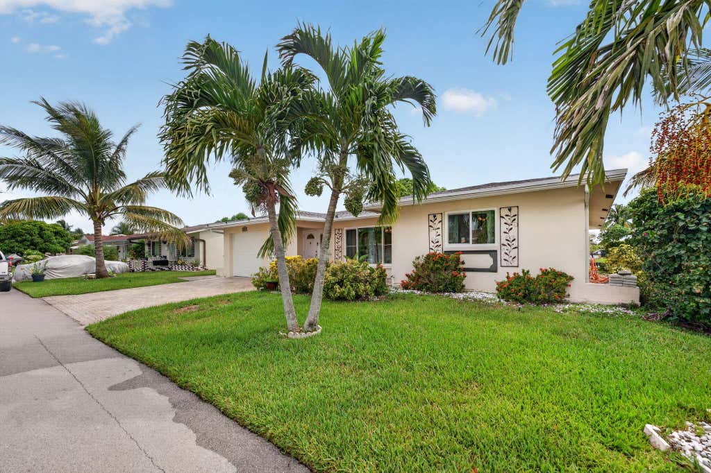Photo of 4716 NW 49TH Place, Tamarac, FL 33319 (MLS # B26058822)
