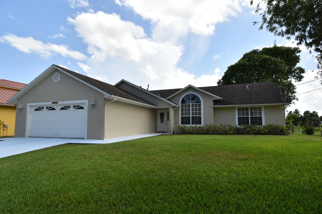 Photo of 1654 SW Lexington Drive, Port Saint Lucie, FL 34953 (MLS # R11162323)