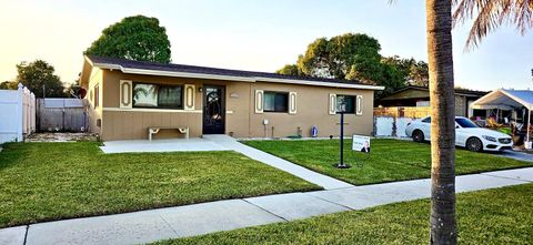 Photo of 1481 SW 7th Terrace, Deerfield Beach, FL 33441 (MLS # R11162965)