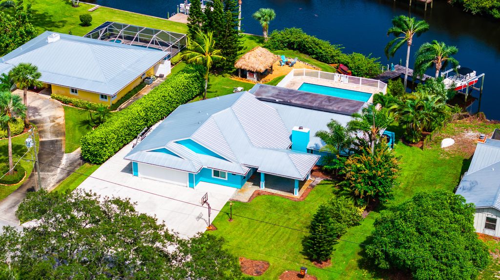 Photo of 1121 SW Pine Tree Lane, Palm City, FL 34990 (MLS # R11025024)