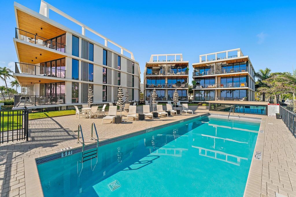 Photo of 106 Inlet Way #202, Palm Beach Shores, FL 33404 (MLS # R10856889)