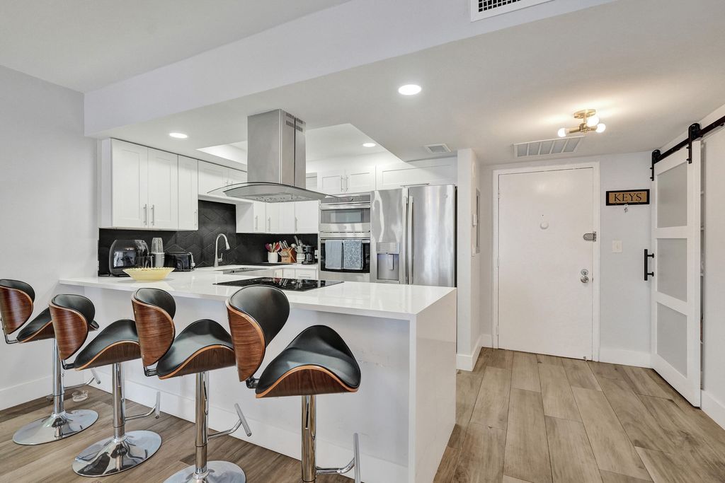 Photo of 600 Three Islands Boulevard #615, Hallandale Beach, FL 33009 (MLS # B26023017)
