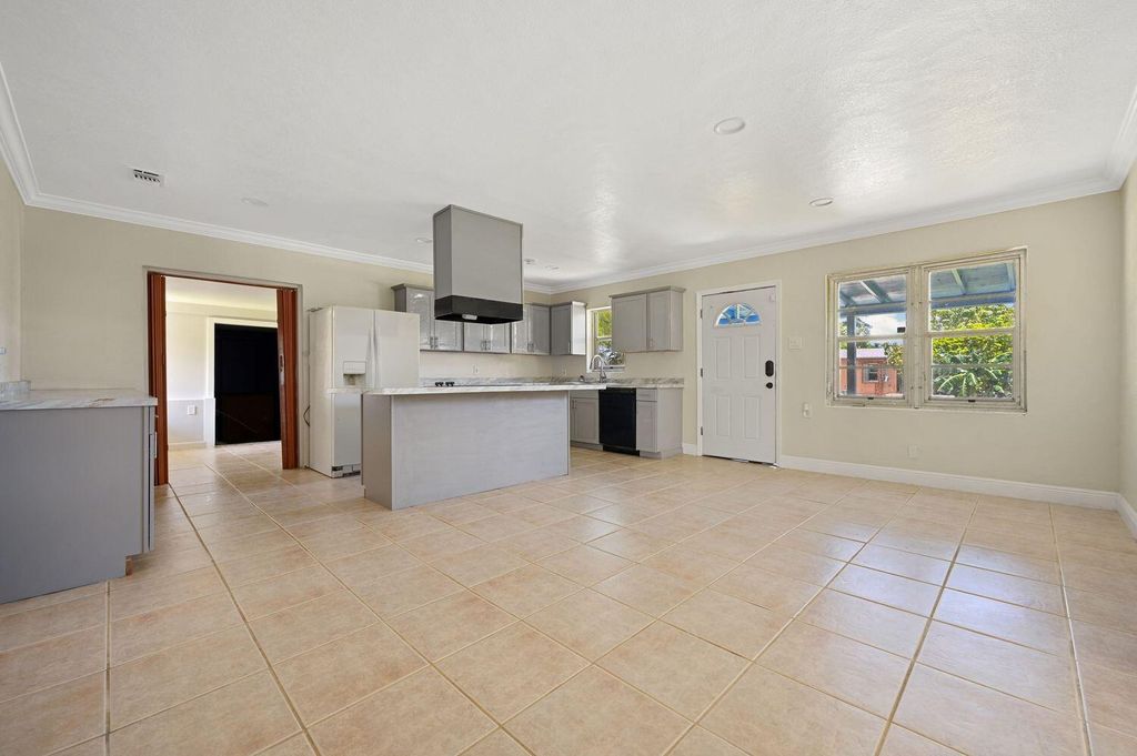 Photo of 308 NW Avenue H Place, Belle Glade, FL 33430 (MLS # R10901989)