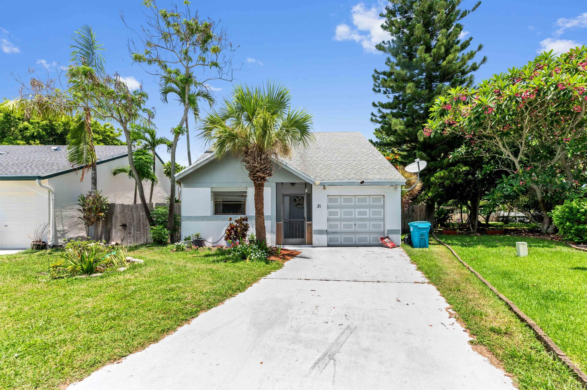 Experience the charm of single-family living in the desirable community of Lakes of Tara, perfectly nestled in Boynton Beach, FL. This delightful home features 3 bedrooms and 2 bathrooms, thoughtfully designed to ensures privacy and comfort. Step inside to discover a bright and inviting atmosphere, enhanced by elegant vaulted ceilings that add an expansive feel to the combined living and dining areas. This open concept creates a wonderful flow for both daily living and entertaining, making the most of every square foot.