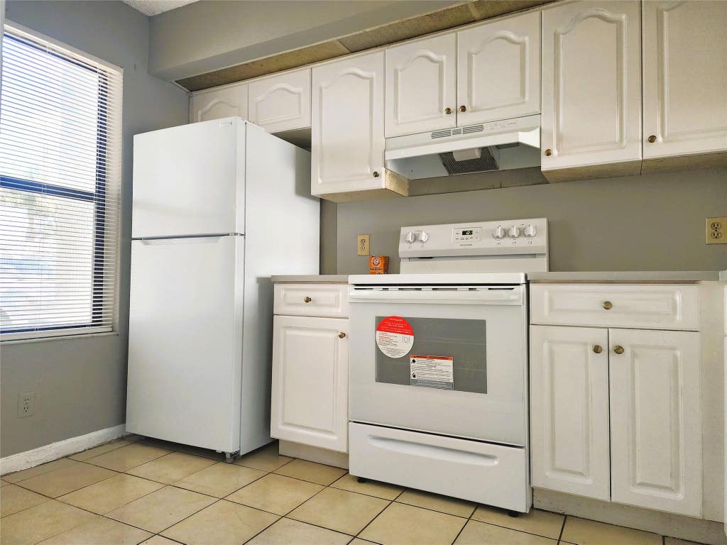 Photo of 217 LAKE POINTE Drive #107, Oakland Park, FL 33309 (MLS # B26054608)