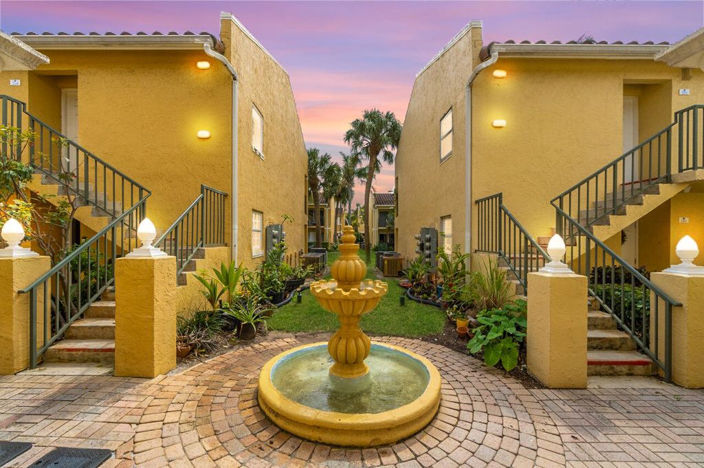 Photo of 1140 Lake Shore Drive #202, Lake Park, FL 33403 (MLS # R11167904)