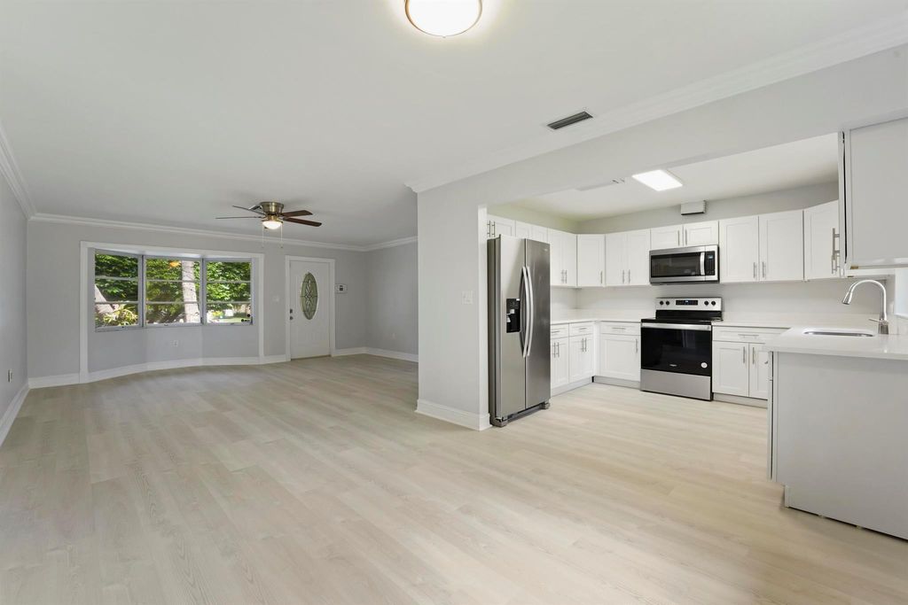 Photo of 1201 NW 7th Court, Boynton Beach, FL 33426 (MLS # R11115055)