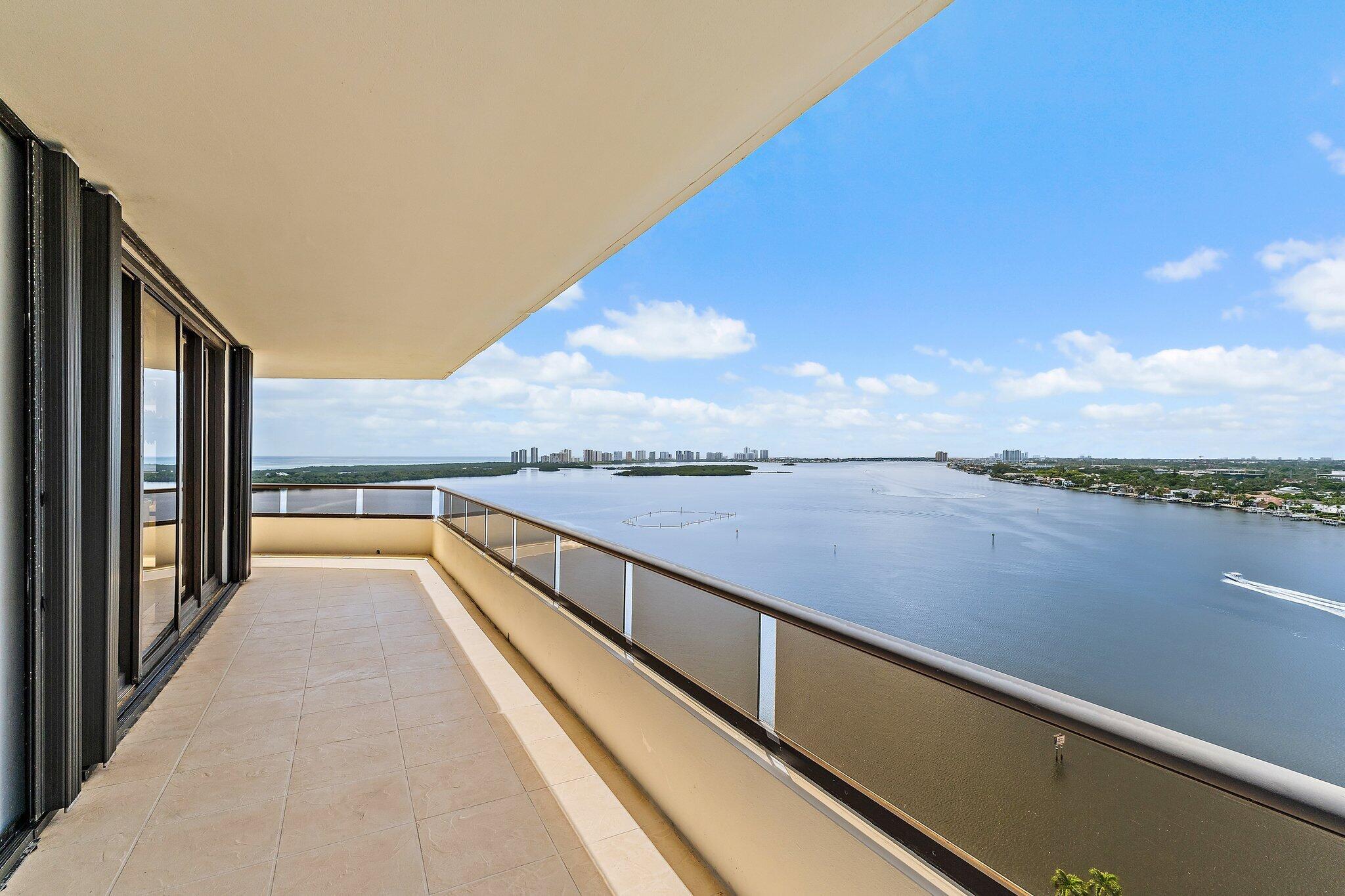 Experience the best views in Northern Palm Beach County from the rarely available 58 stack in Lake Point Towers. This expansive 3,400 sq. ft. residence on the 15th floor offers sweeping vistas of the ocean, Intracoastal, marina, and city skyline from every room. Featuring 3 bedrooms, 3.1 baths, plus an office, the home is enhanced by a wraparound balcony, timeless updates, and electronic shades for effortless living. Offered furnished or unfurnished, this luxury condo in a pet friendly building includes two assigned parking spaces and delivers an unmatched lifestyle in one of Palm Beach County's premier addresses.