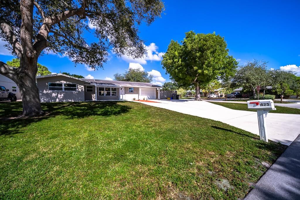 Photo of 425 Erie Drive, Jupiter, FL 33458 (MLS # R11117500)