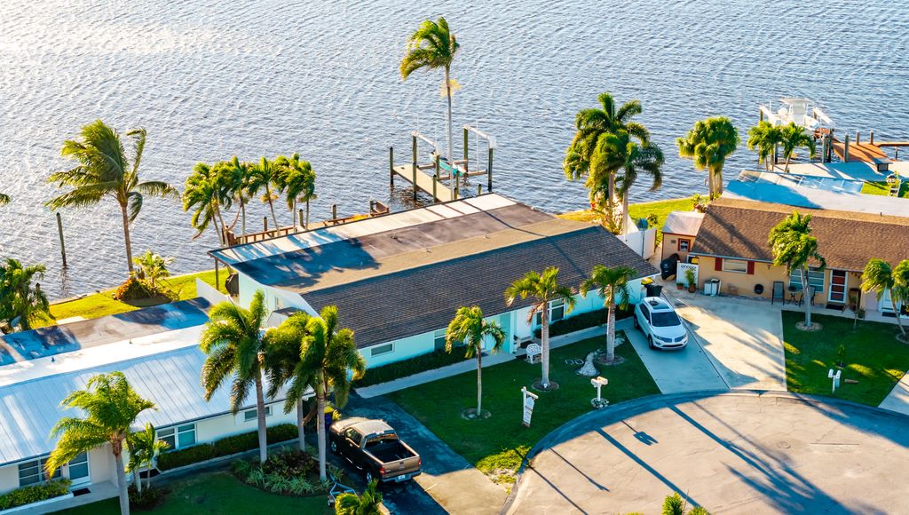 Photo of 140 SW Hideaway Place, Stuart, FL 34994 (MLS # R10992076)