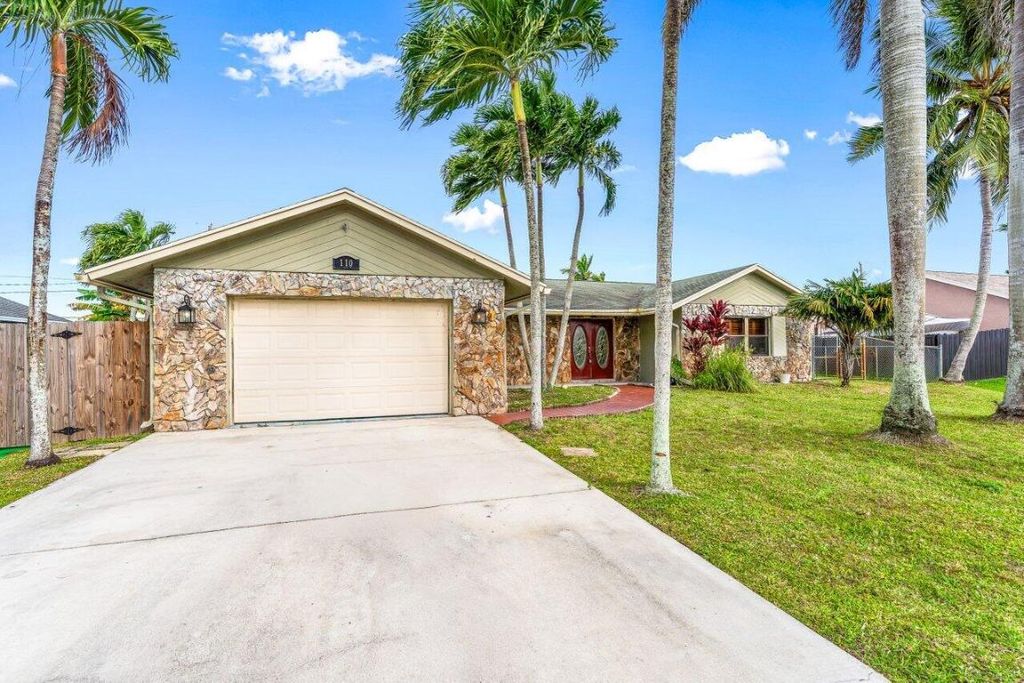 Photo of 110 W Rubber Tree Drive #Main House, Lake Worth, FL 33467 (MLS # R11150343)