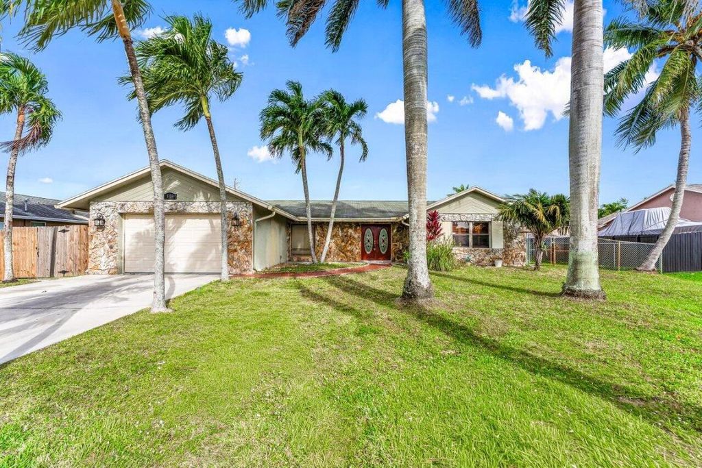 Photo of 110 W Rubber Tree Drive #Main House, Lake Worth, FL 33467 (MLS # R11150343)